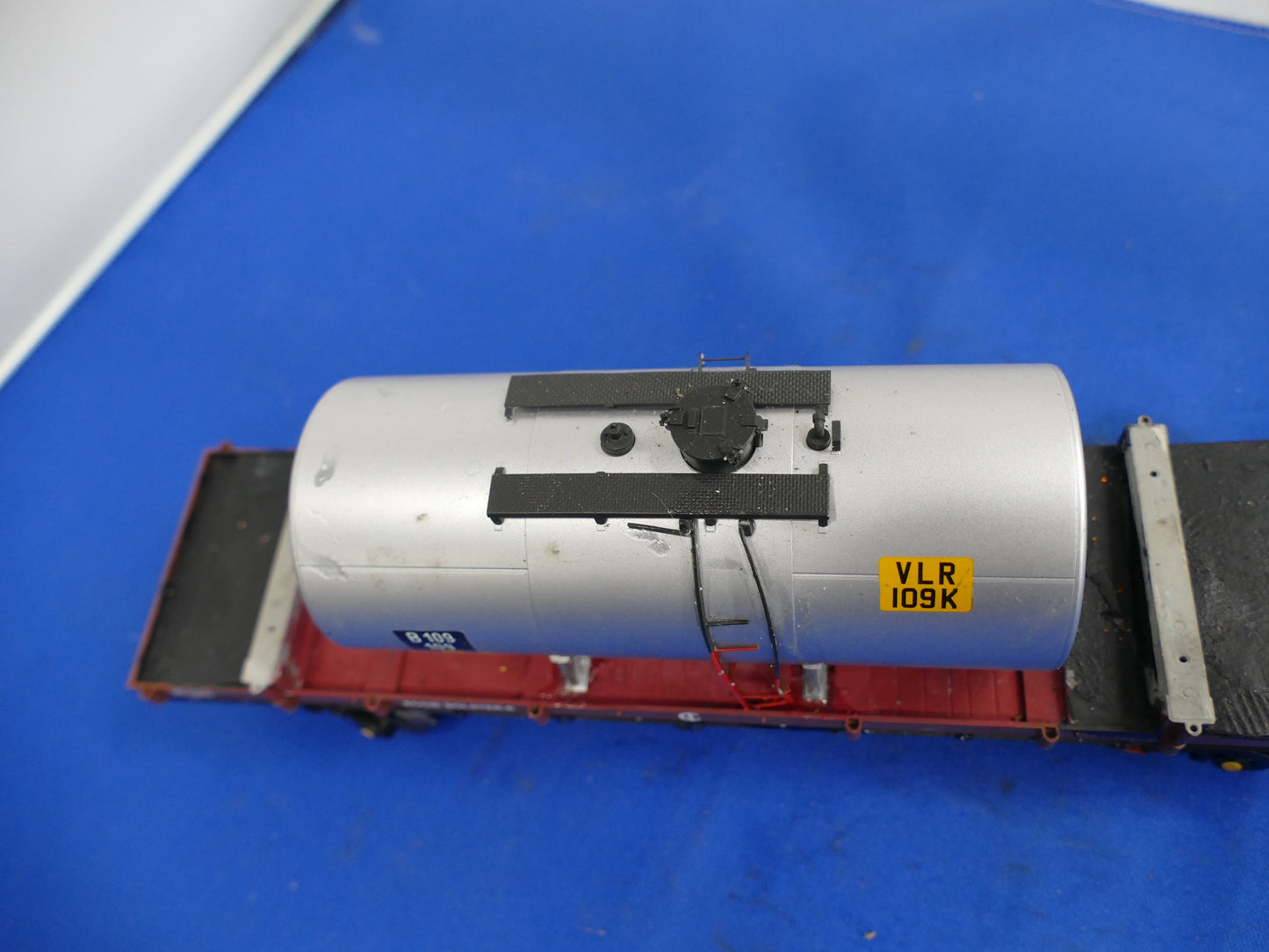 "O" Gauge Silver Tanker on Bogie Flatbed (used)