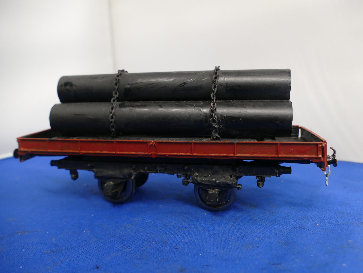 "O" Gauge Flatbed with Pipe Load (used)