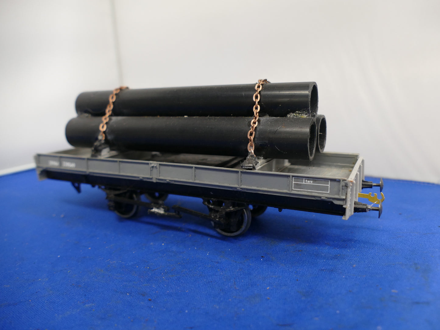 "O" Gauge Flatbed with Pipe Load (used)